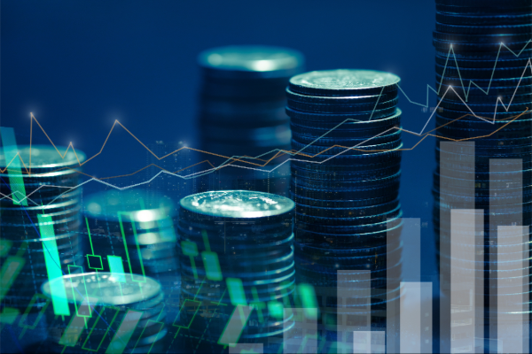A stack of coins with a digital graph and a blue background