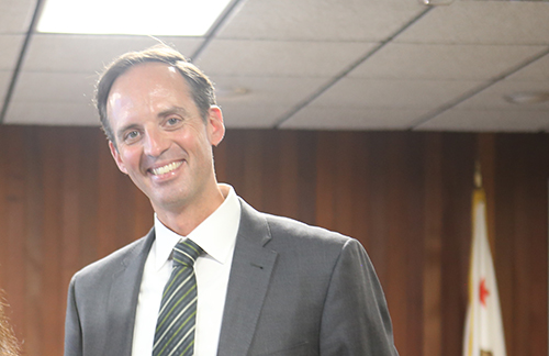 Chancellor in a gray suit