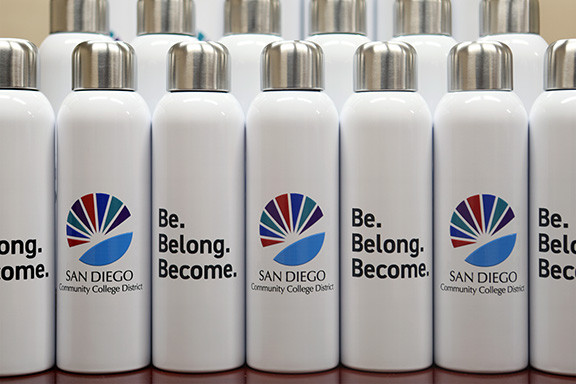 District sunburst logo water bottles