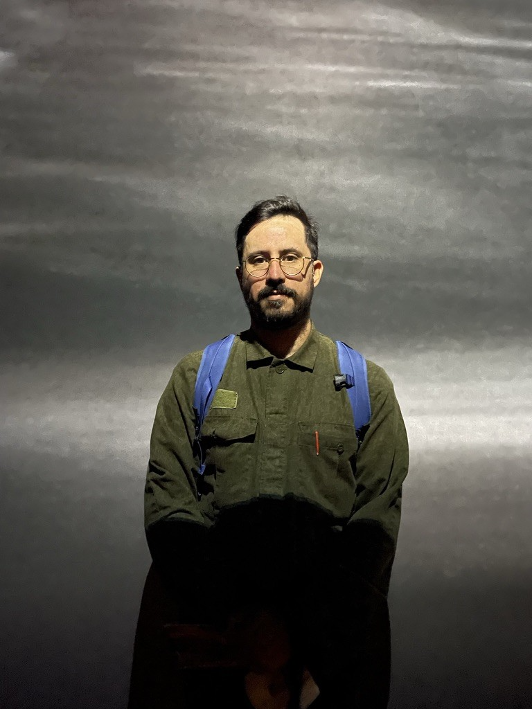 pablo dodero bearded glasses army green jacket 