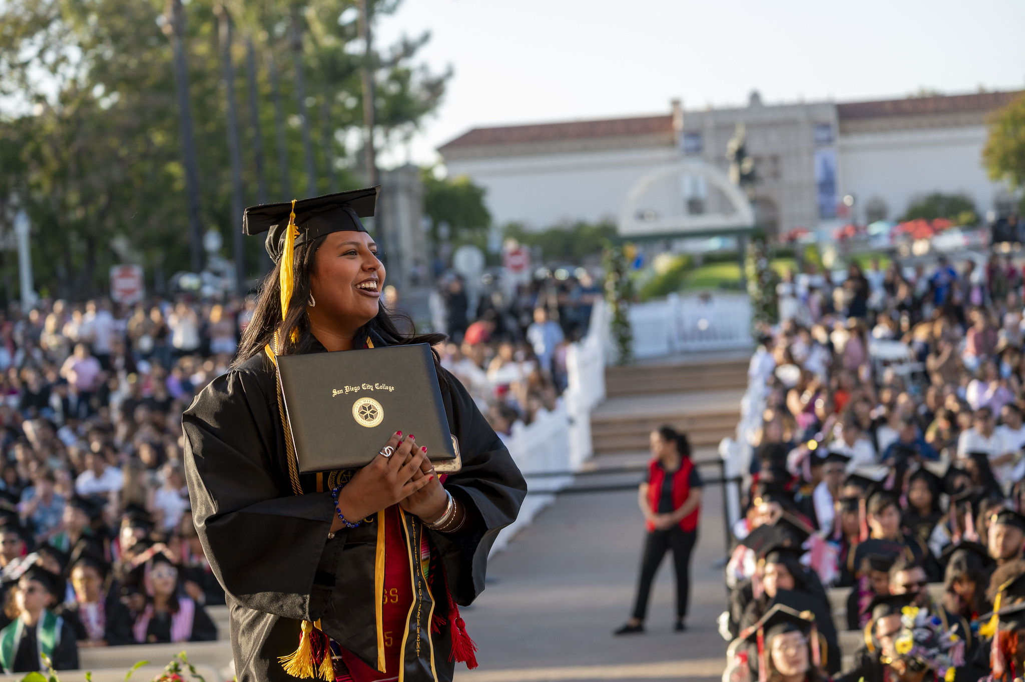 
Associated Students President Daliah Ramirez holds up her degree.
