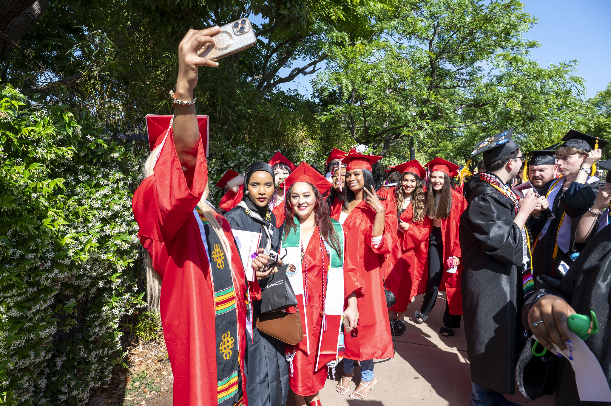 
A group of graduates taking a selfie as they line up before the ceremony.
