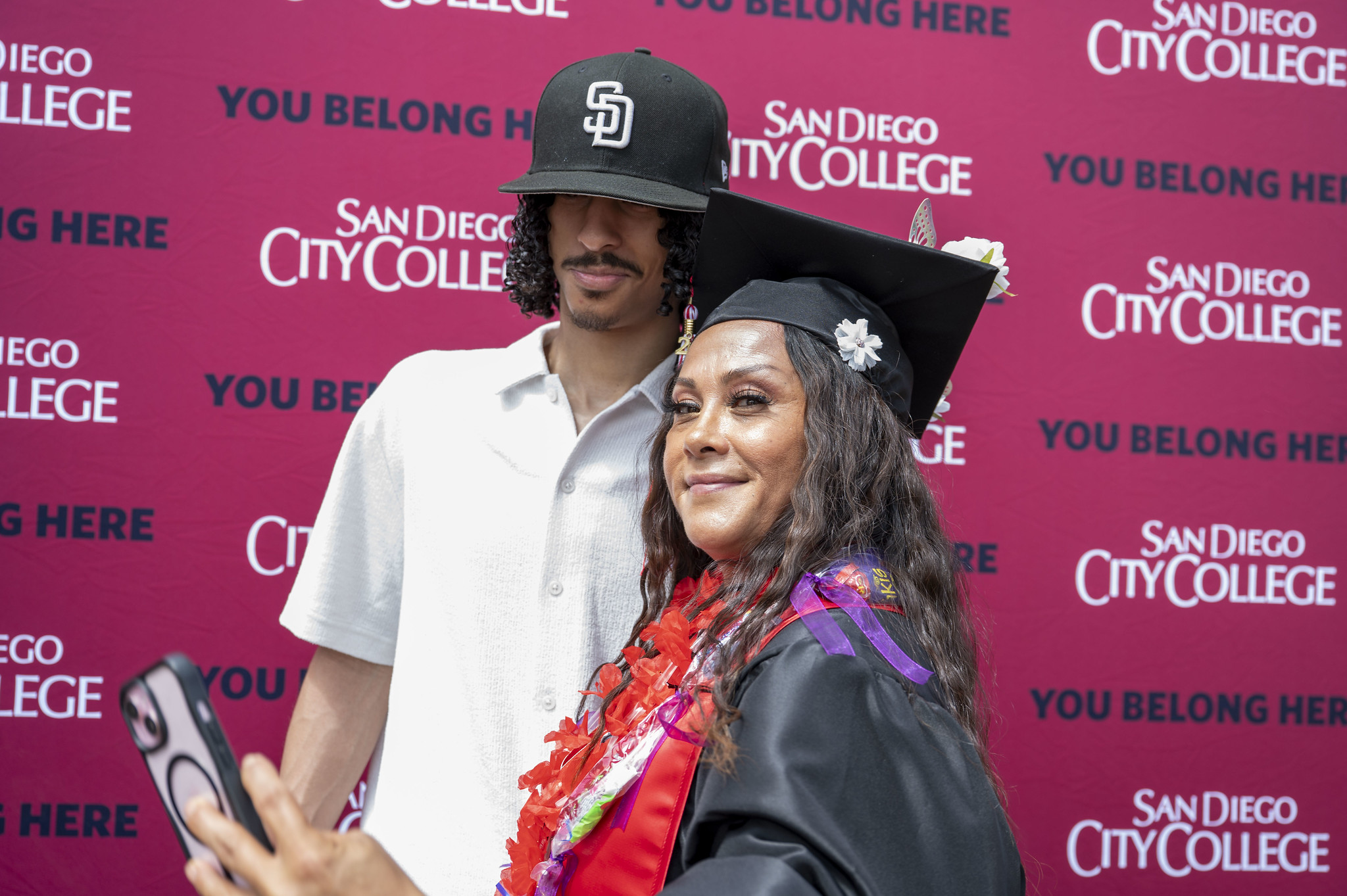 
A graduate with a family member.
