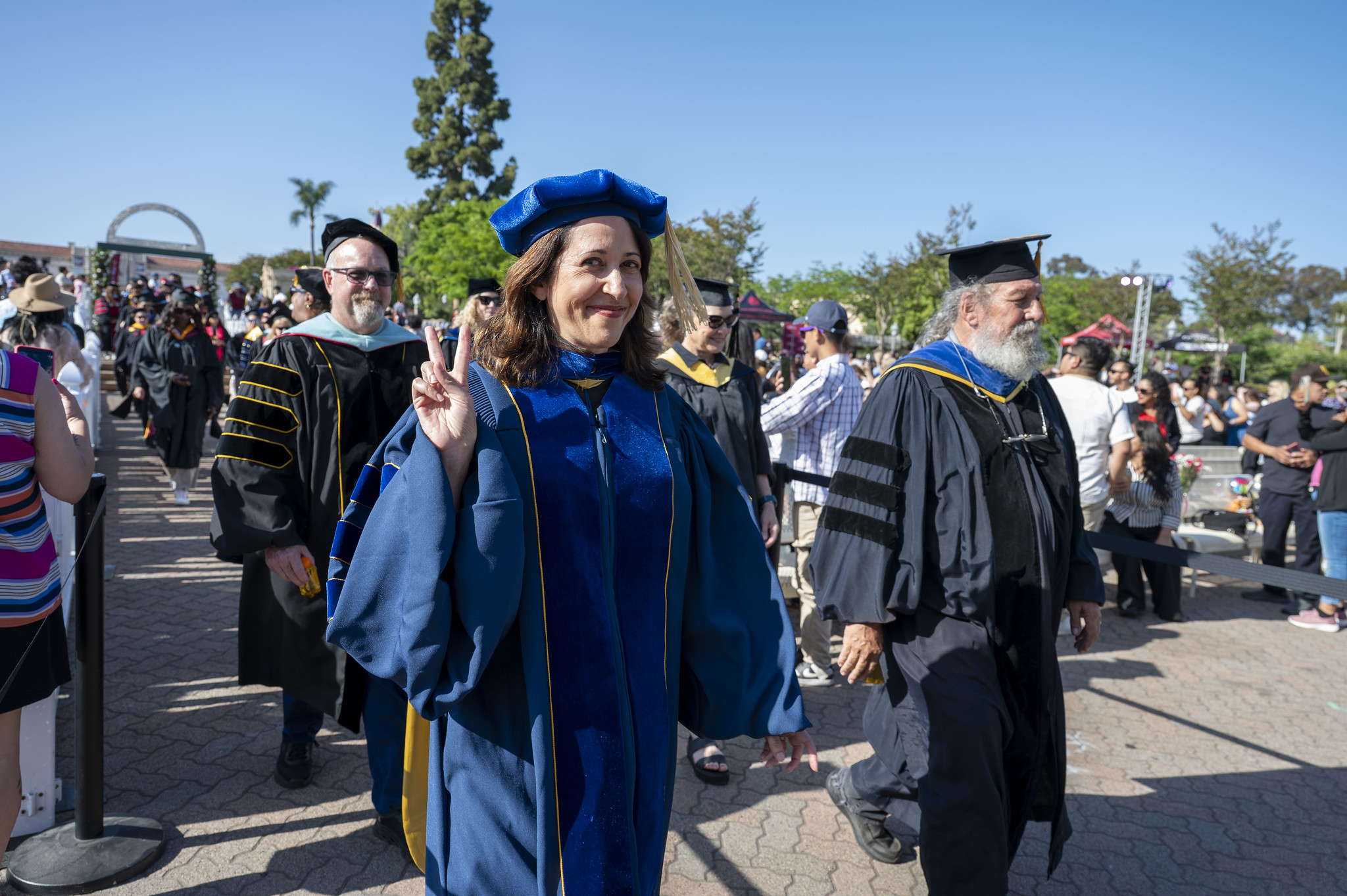 
City College faculty heading to the stage.
