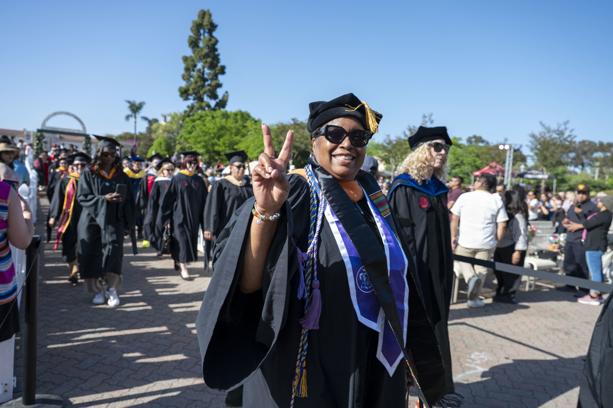
City College faculty heading to the stage.
