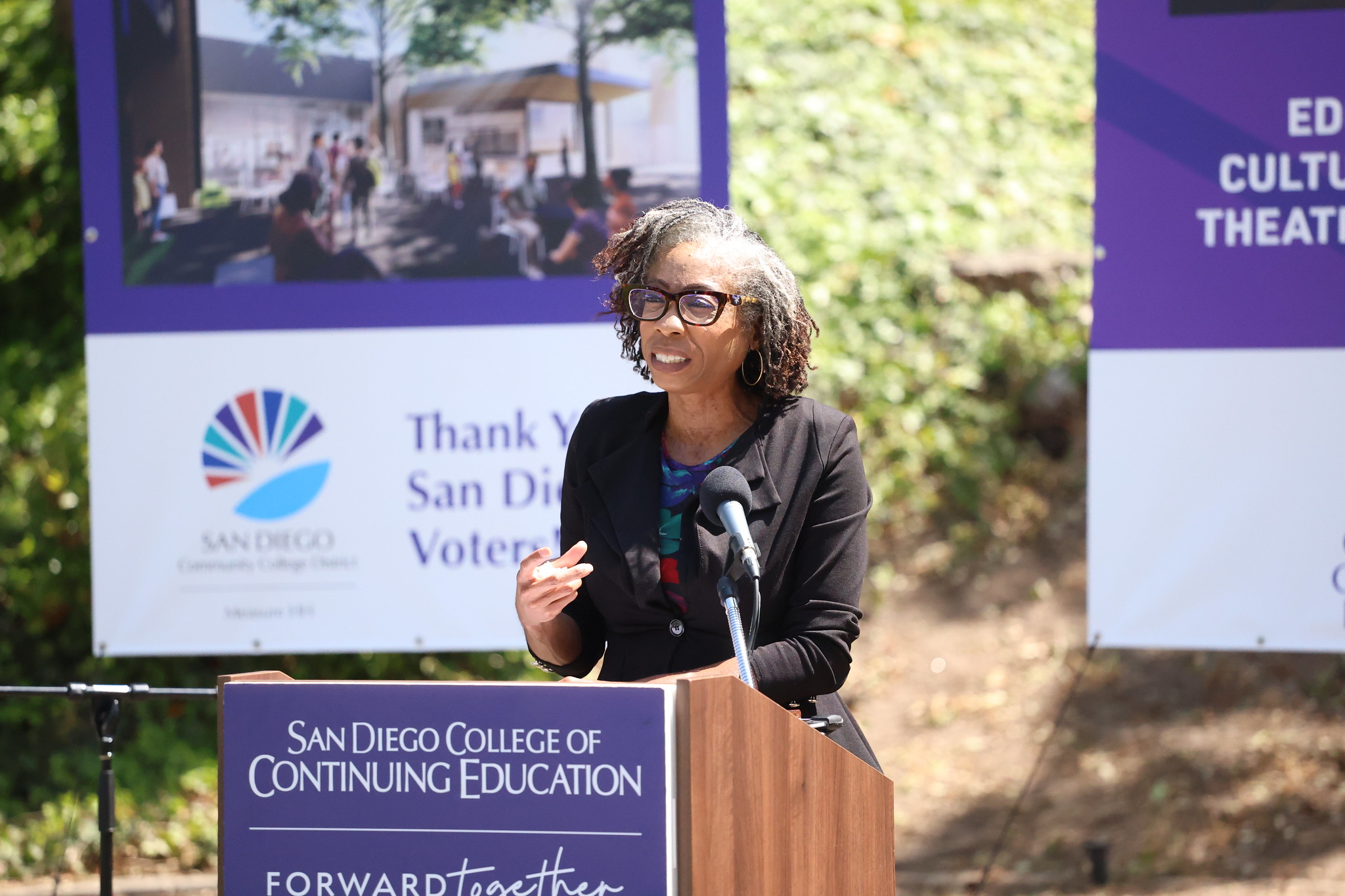 
County Supervisor Monica Montgomery Steppe speaks at a podium.
