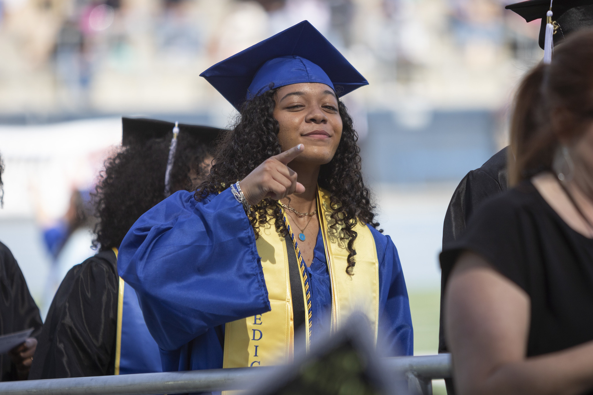 
A valedictorian heads to the stage to get her diploma.
