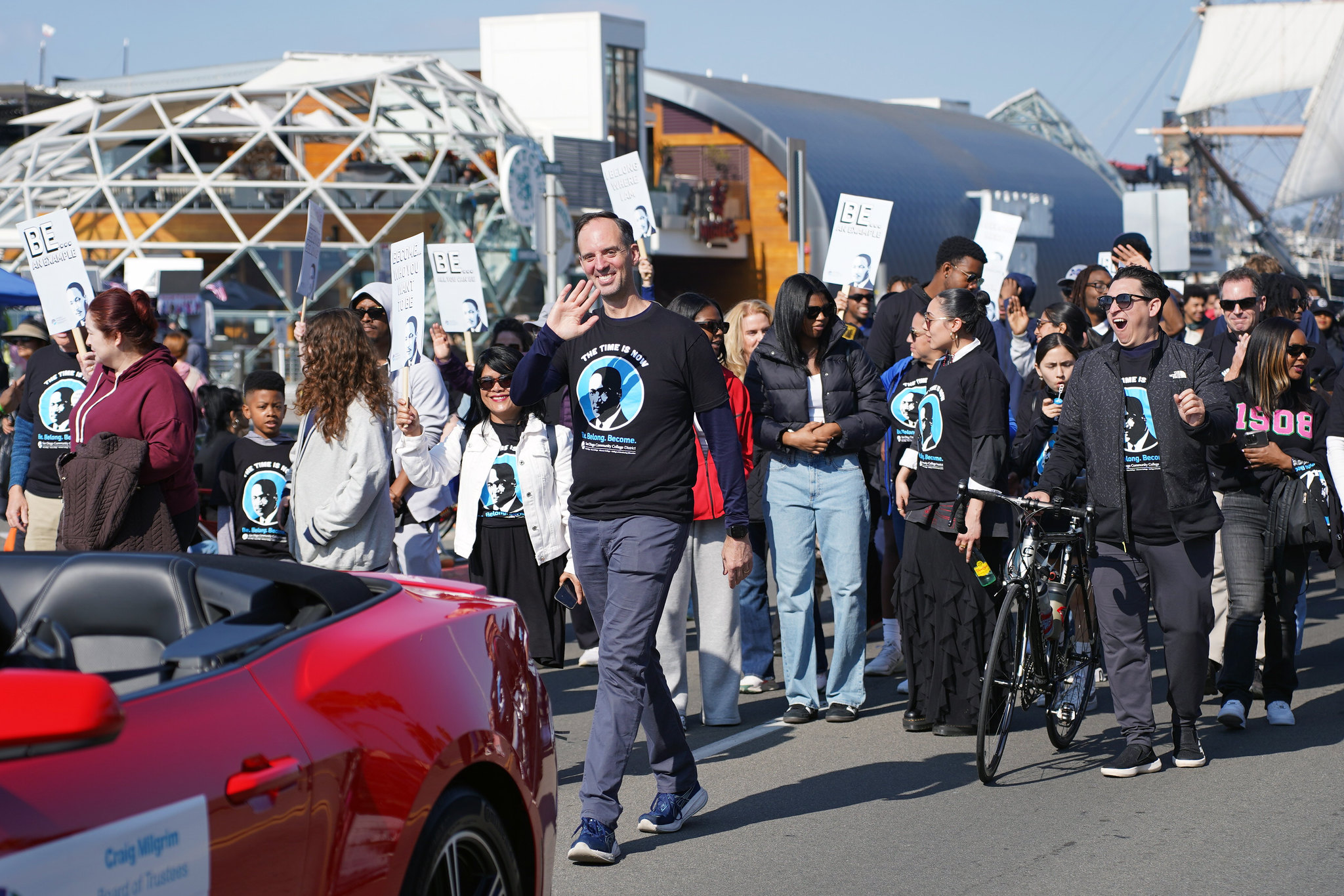 Chancellor Gregory Smith waves while walking in the parade.