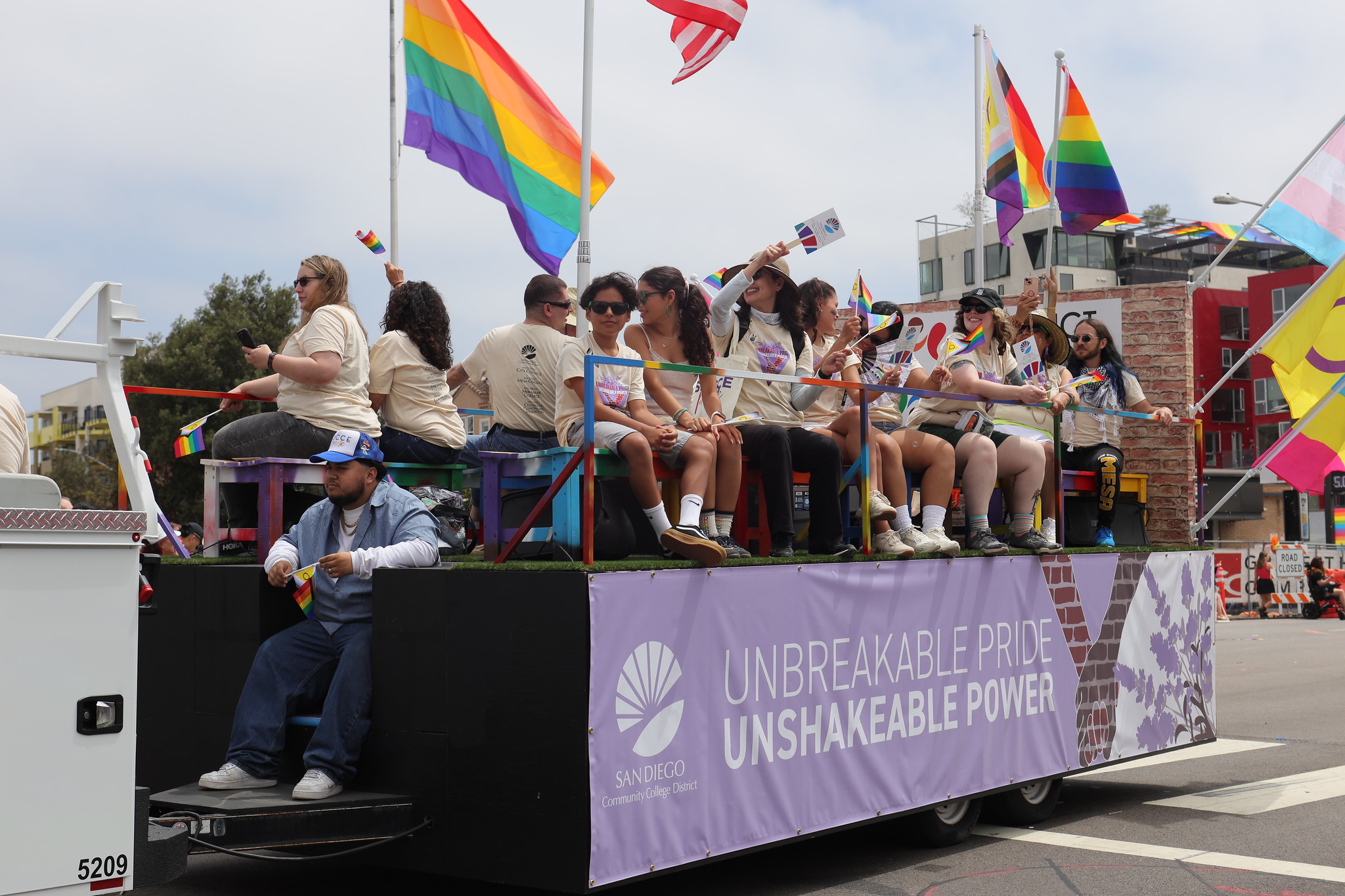 
About 20 people sit in the district float.
