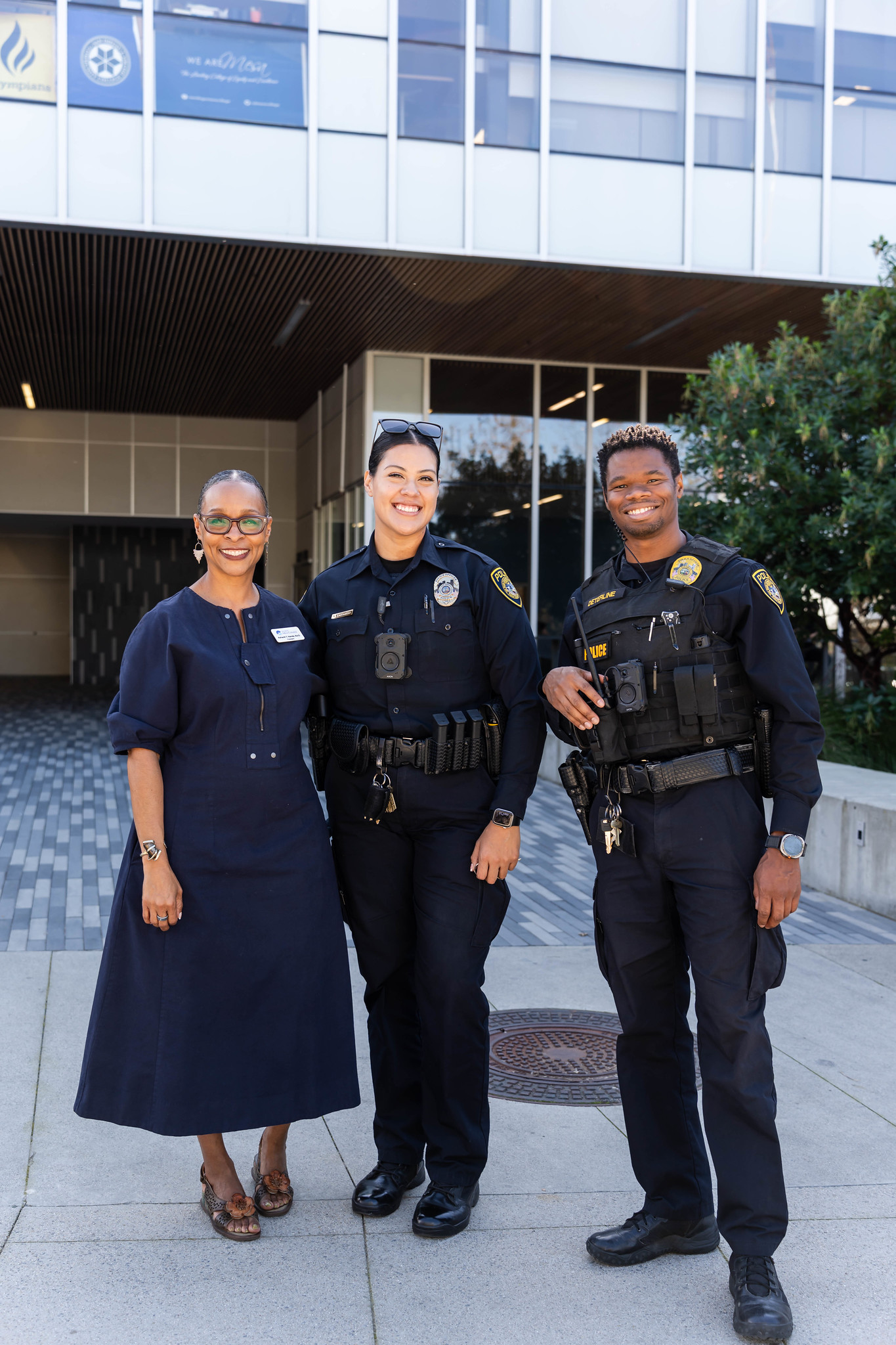 
Mesa College President Ashanti Hands with two college police officers.
